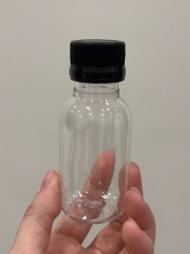 Envase de PLÁSTICO TRANSPARENTE 60ml corto + tapa ciega/común NEGRA
