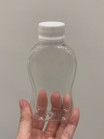 Envase de PLÁSTICO TRANSPARENTE 100ml onda + tapa ciega/común blanca