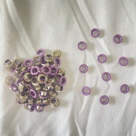 ojales LILAS 200 unidades aprox