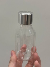 Envase de PLÁSTICO TRANSPARENTE 100ml + tapa difusora plateada